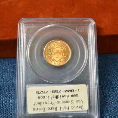 LOT 409. SWISS GOLD 20 FRANCS HELVETIA COIN