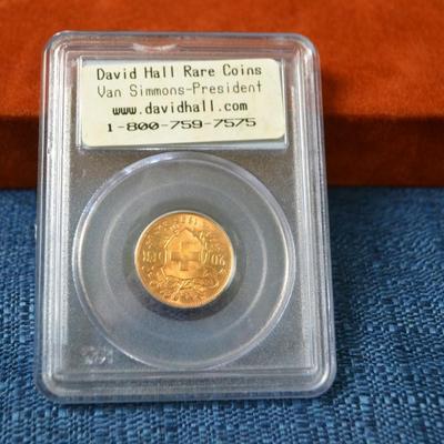 LOT 409. SWISS GOLD 20 FRANCS HELVETIA COIN