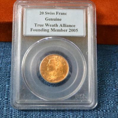 LOT 409. SWISS GOLD 20 FRANCS HELVETIA COIN