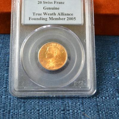 LOT 409. SWISS GOLD 20 FRANCS HELVETIA COIN