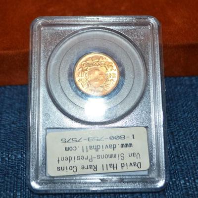 LOT 409. SWISS GOLD 20 FRANCS HELVETIA COIN