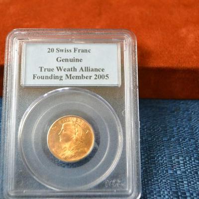 LOT 409. SWISS GOLD 20 FRANCS HELVETIA COIN