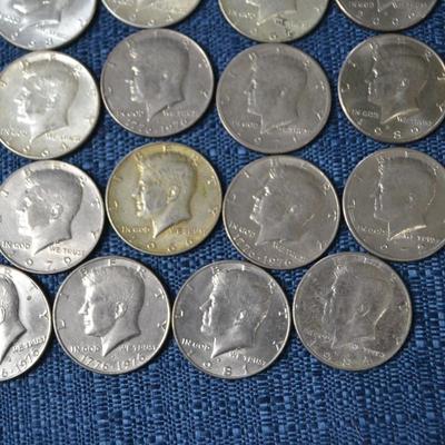 LOT 411.  JFK HALF DOLLAR COINS