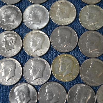 LOT 411.  JFK HALF DOLLAR COINS