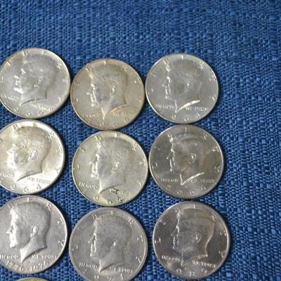 LOT 411.  JFK HALF DOLLAR COINS