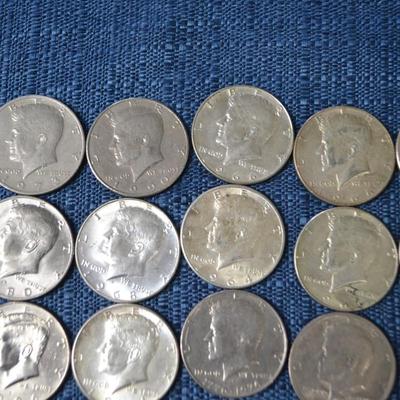 LOT 411.  JFK HALF DOLLAR COINS