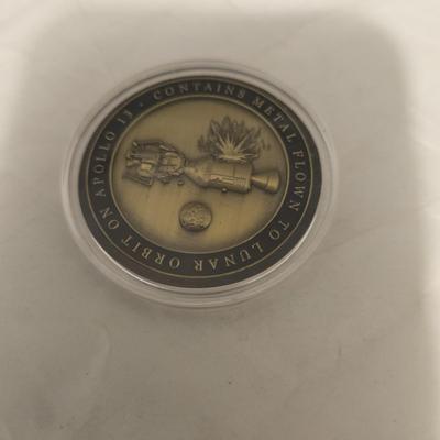 Apollo 13 medal flown to lunar orbit