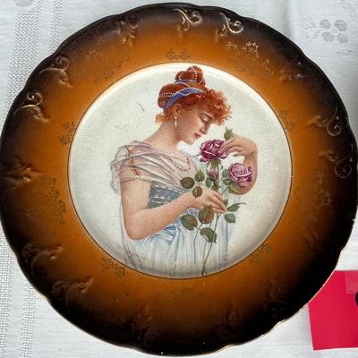 Pair of Lady Plates.