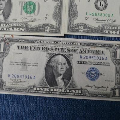 LOT 471. EIGHT TWO DOLLAR GREEN SEAL BILLS AND ONE DOLLAR SILVER CERTIFICATE