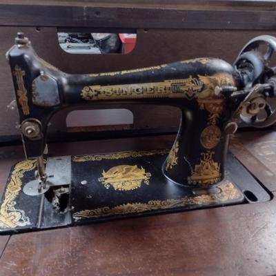 Antique Cast Body Treadle Singer Sewing Machine with Cabinet