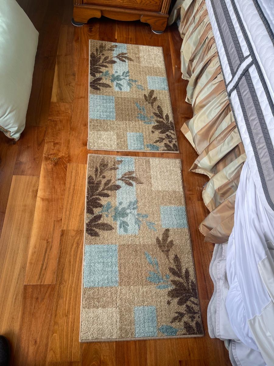 2 matching rugs. Each is 34” x 20”
