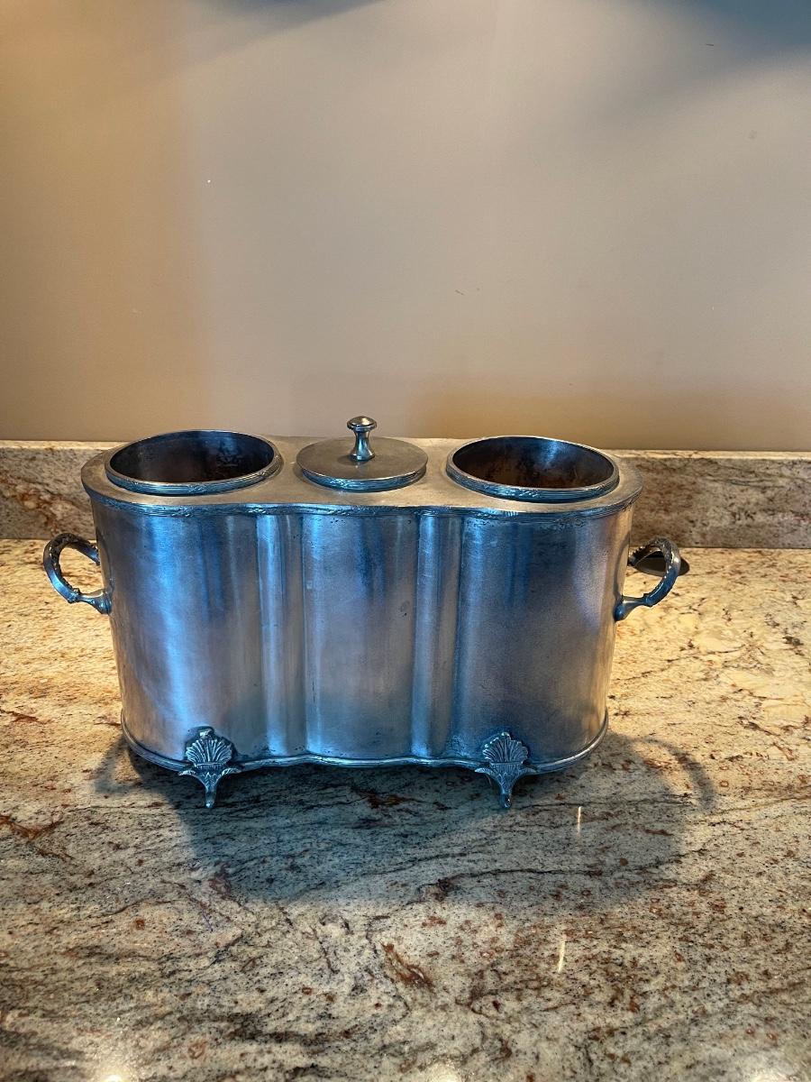 Antique pewter wine cooler and bottle holder. Holds Wine bottles on each side and ice in the