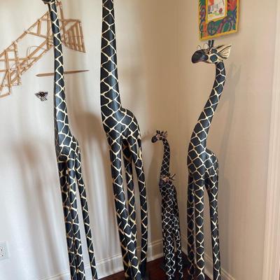 Family of 5 giraffes. The owner wants them sold as a set. Message me if you would like to buy separately. .