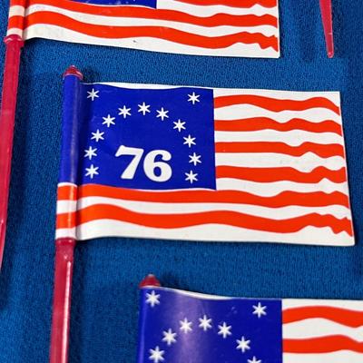 BUNCH OF â€˜76 FLAGS ON PLASTIC PICKS