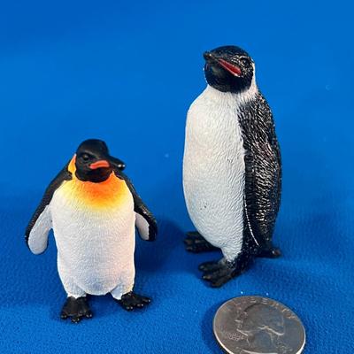 PAIR OF PLASTIC PENGUIN FIGURES 2-1/2â€ TALL-TALLEST