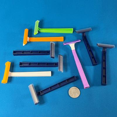 9 DISPOSABLE RAZORS UNUSED