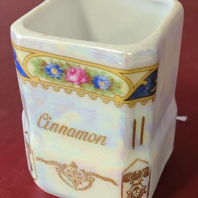 German Flour and Cinnamon containers - 6 1/2 inches tall and 3 inches tall