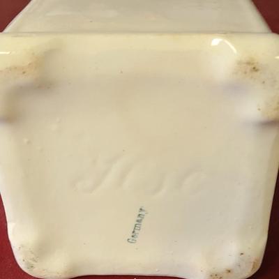 German Flour and Cinnamon containers - 6 1/2 inches tall and 3 inches tall