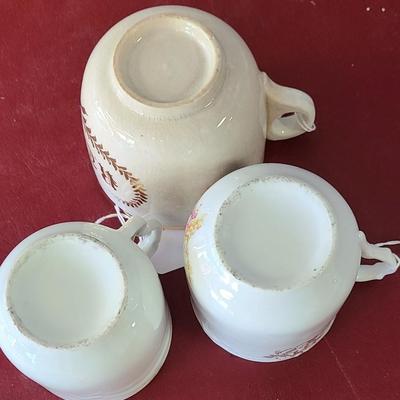 3 Moustache cups  -  one has a chip