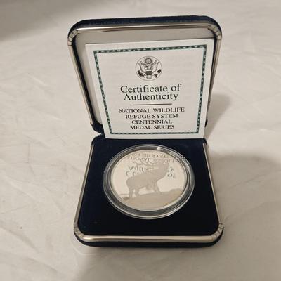 National wildlife refuge system celebrating a century of conservation 1903-2003 Theodore Roosevelt coin