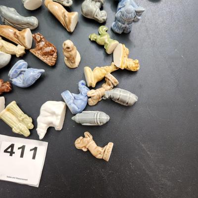 Total of 70 Wade Rose Tea Figurines