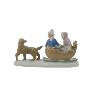 Vintage Porcelain Dog and Sled Figurine