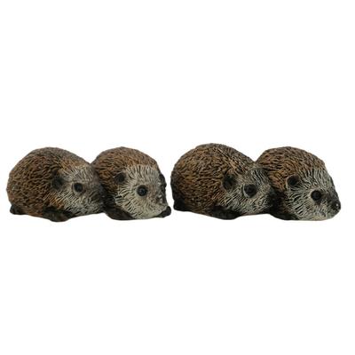 Two Baby Hedgehogs Figurines