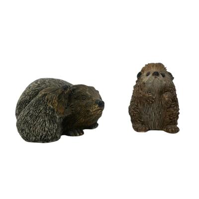 Two Hedgehog Figurines