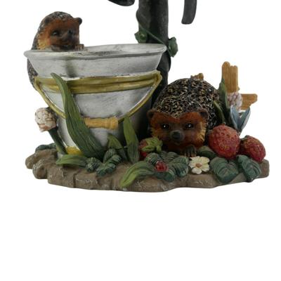 Large Water Spout and Hedgehog Figurine