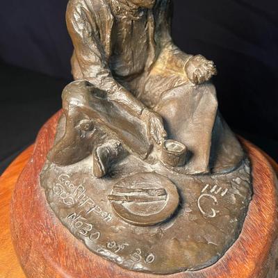 Geo Phippen bronze sculpture of sitting cowboy