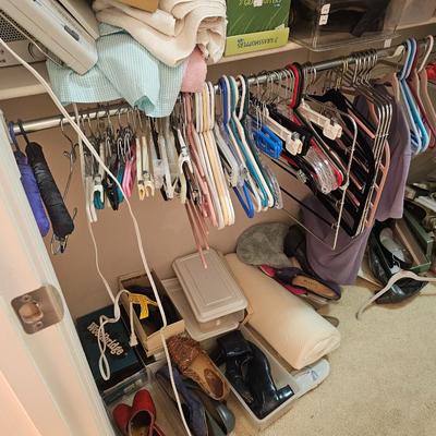 Closet full of clothes and shoes