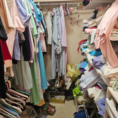 Closet full of clothes and shoes