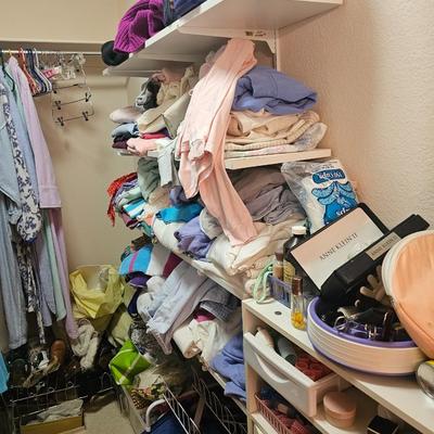 Closet full of clothes and shoes
