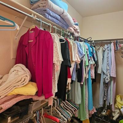 Closet full of clothes and shoes