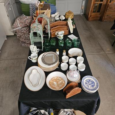 Table full of China and decor