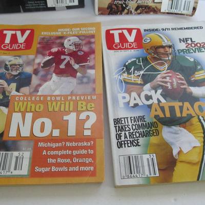 4 Older TV Guides, 1997 on 3 and the Favre One is 2002