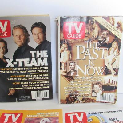 4 Older TV Guides, 1997 on 3 and the Favre One is 2002
