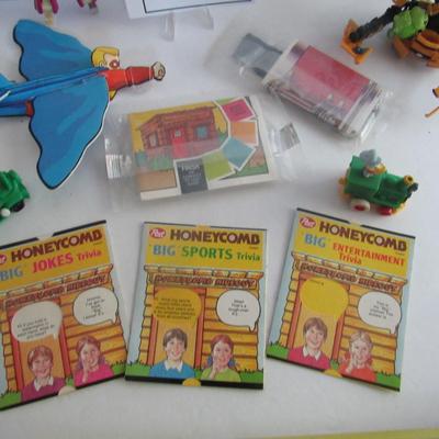 Lot of Older Cereal Premium Toys and Transformers