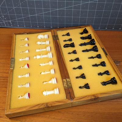 Folding Chess board with pieces inside