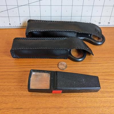 3 black magnifiers