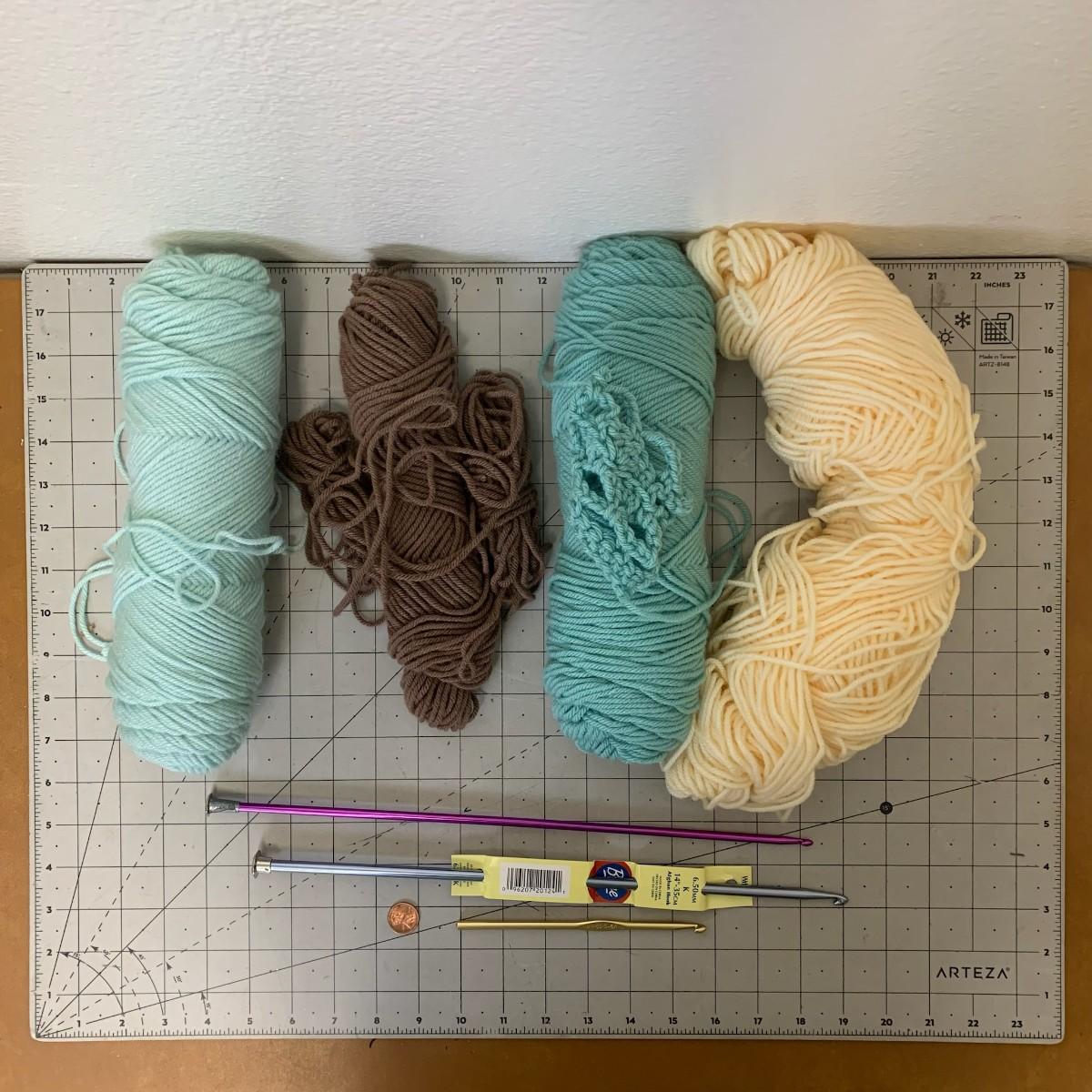 Yarn (4) + knitting needles + croquet hook