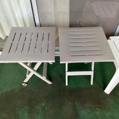 4 plastic tables or ottomans outdoor furniture