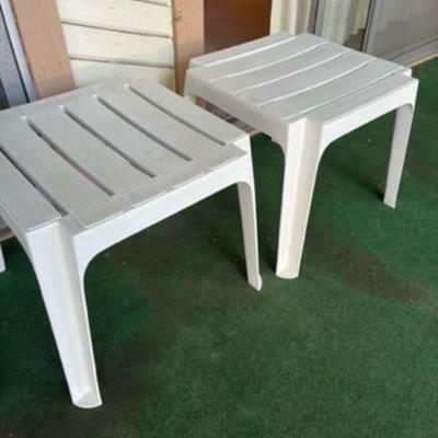 4 plastic tables or ottomans outdoor furniture
