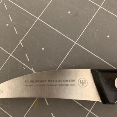 2 knives with black handle (one is Ed. Wusthof Dreizackwerk)