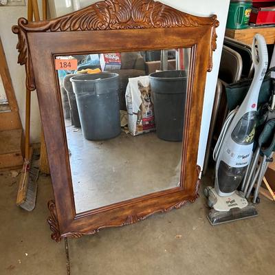 Large ornate wooden mirror