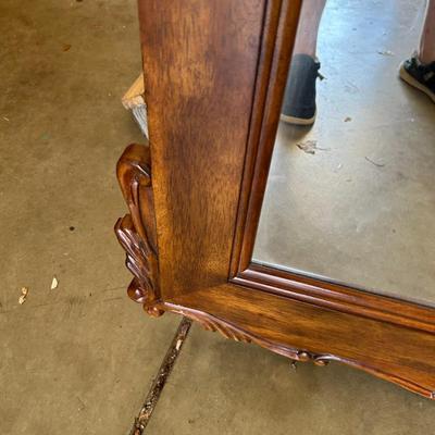 Large ornate wooden mirror