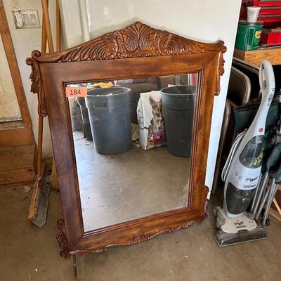 Large ornate wooden mirror