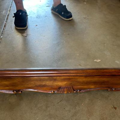 Large ornate wooden mirror