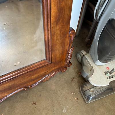 Large ornate wooden mirror