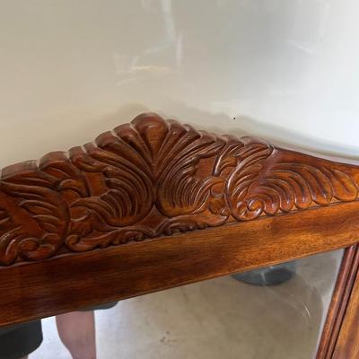 Large ornate wooden mirror